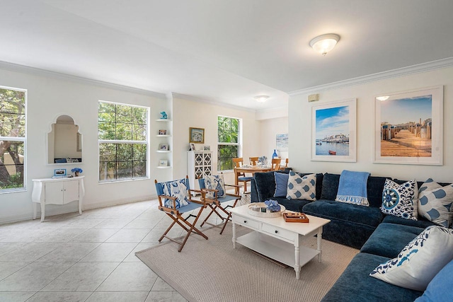 living room with ornamental molding and light tile patterned floors