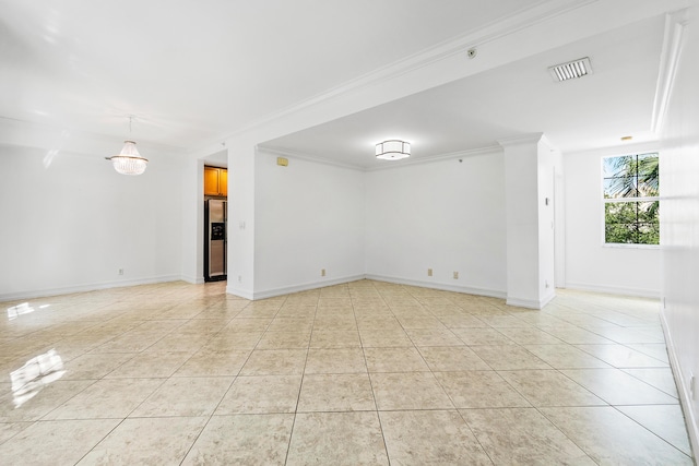 tiled empty room with crown molding