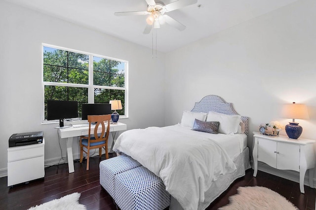 bedroom featuring dark wood-type flooring and ceiling fan