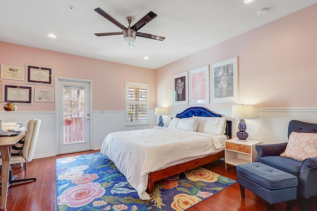 bedroom featuring ceiling fan, hardwood / wood-style floors, and access to outside