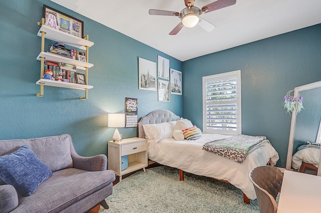 bedroom featuring ceiling fan