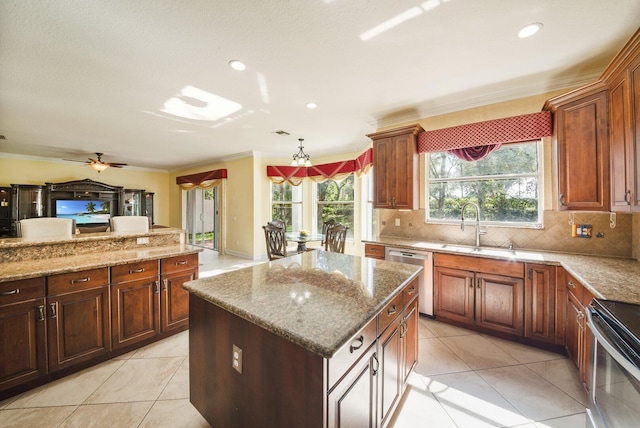 kitchen with a sink, stainless steel appliances, backsplash, and crown molding