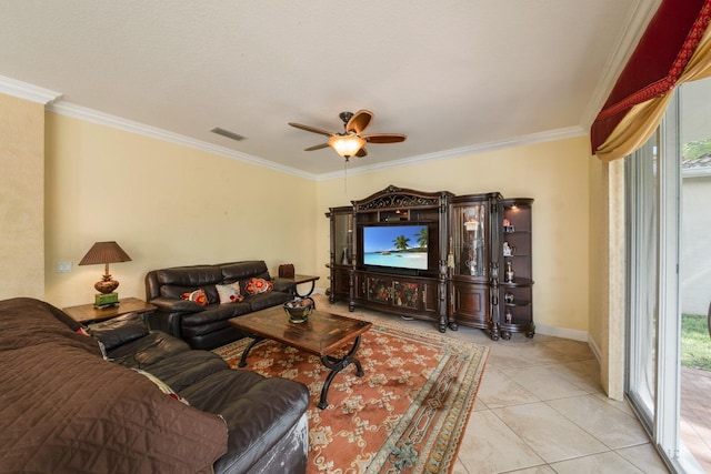 living area featuring crown molding, plenty of natural light, visible vents, and ceiling fan