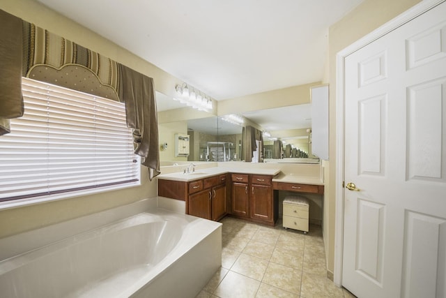 full bath featuring a shower with shower door, a garden tub, vanity, and tile patterned flooring