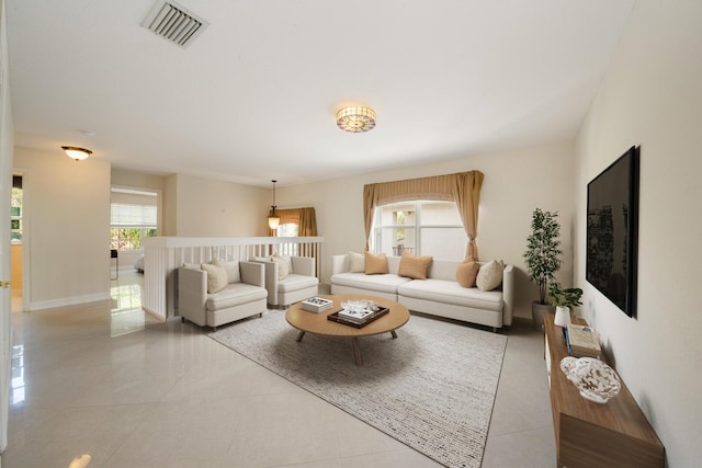 tiled living room with visible vents