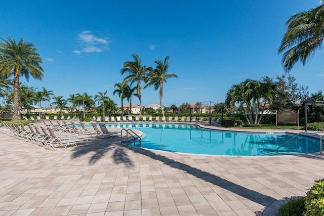 community pool featuring a patio area