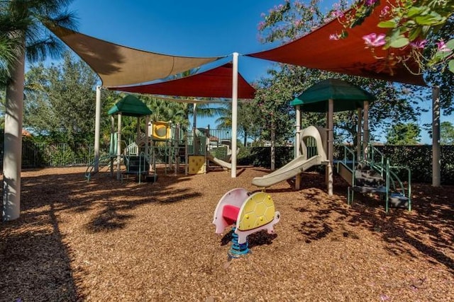 community jungle gym with fence