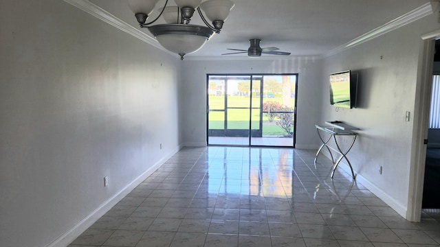 empty room with crown molding and ceiling fan