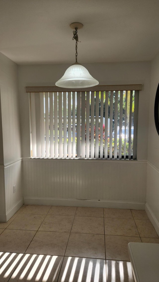 interior space featuring light tile patterned flooring