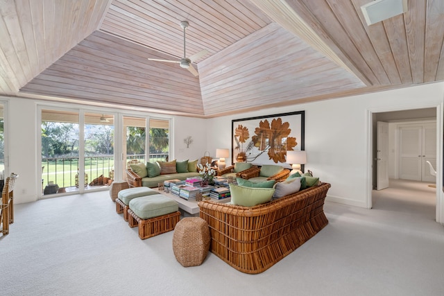 living room featuring lofted ceiling, wood ceiling, ceiling fan, ornamental molding, and light colored carpet