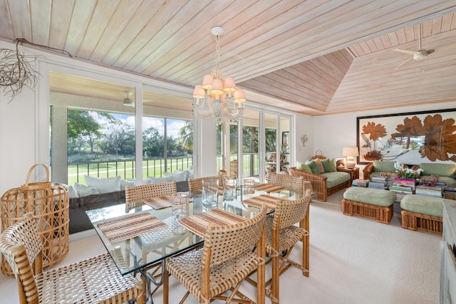 sunroom featuring lofted ceiling, a notable chandelier, and wooden ceiling