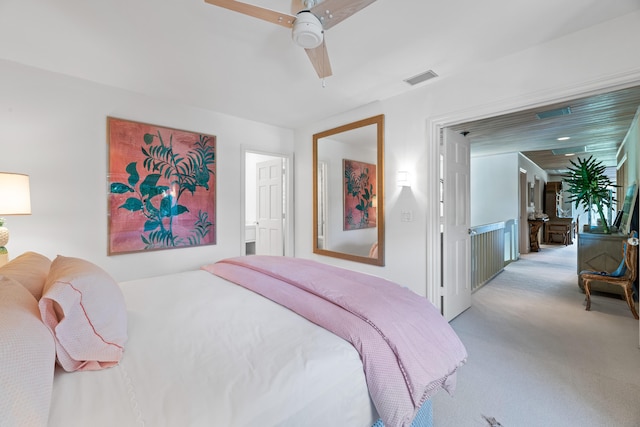 bedroom with light colored carpet and ceiling fan