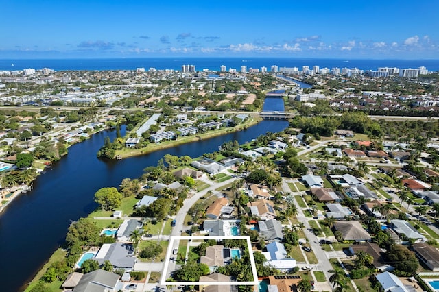 aerial view with a residential view, a water view, and a city view