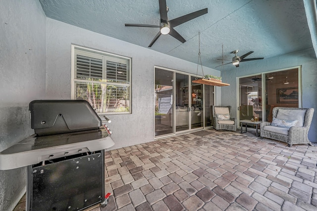 view of patio / terrace with a ceiling fan