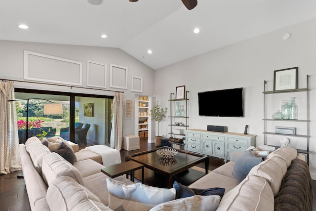 living room with hardwood / wood-style floors, high vaulted ceiling, and ceiling fan