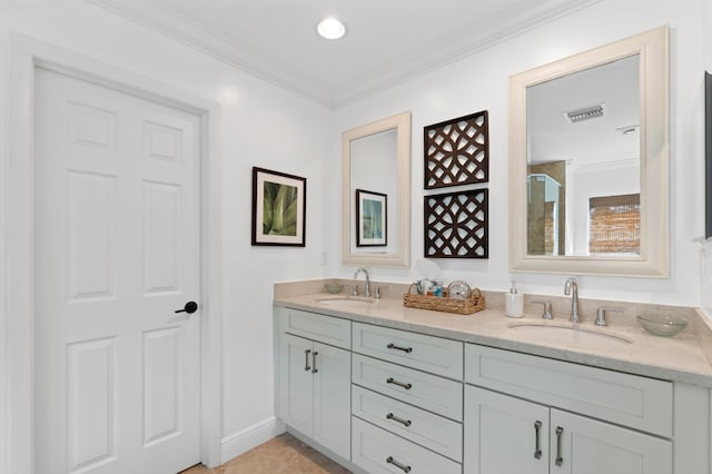 bathroom with ornamental molding and vanity