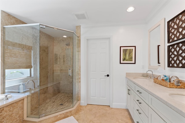 bathroom featuring crown molding, vanity, tile patterned floors, and walk in shower