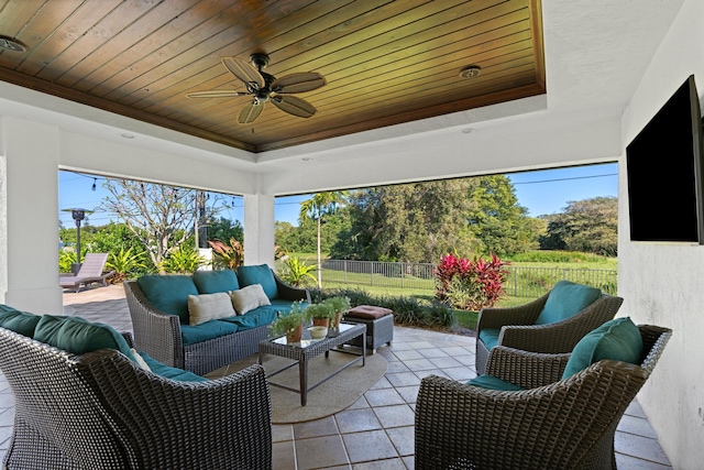 view of patio featuring an outdoor living space and ceiling fan