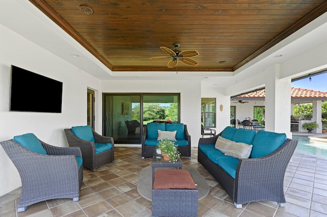 view of patio featuring an outdoor living space and ceiling fan