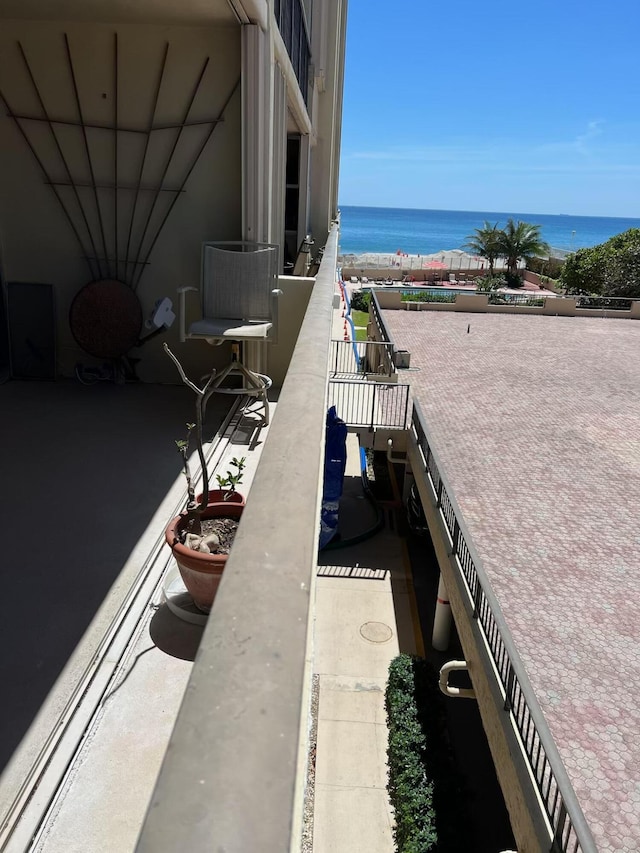 1180 S Ocean Blvd Unit 2-E, Boca Raton, FL 33432 - view of patio with a water view and a balcony