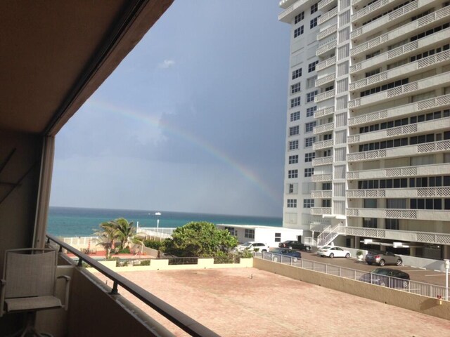 1180 S Ocean Blvd Unit 2-E, Boca Raton, FL 33432 - balcony featuring a water view