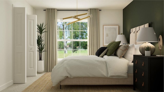 carpeted bedroom featuring multiple windows