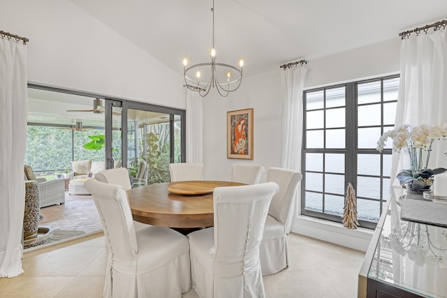 11373 Twelve Oaks Way E, North Palm Beach, FL 33408 - dining space with light tile patterned flooring, a chandelier, lofted ceiling, and ceiling fan