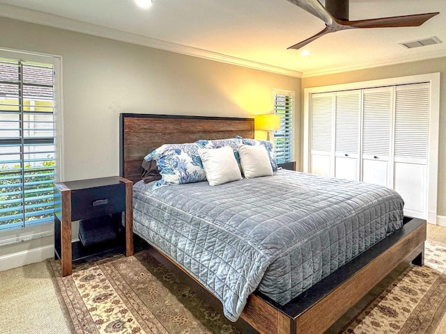 11373 Twelve Oaks Way E, North Palm Beach, FL 33408 - bedroom with ornamental molding, multiple windows, recessed lighting, a ceiling fan, and a closet