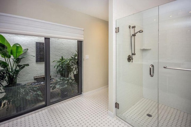 11373 Twelve Oaks Way E, North Palm Beach, FL 33408 - full bath with a stall shower and baseboards