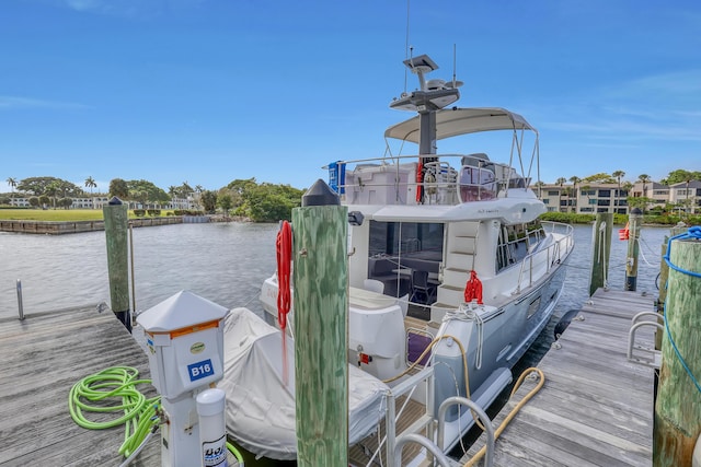 11373 Twelve Oaks Way E, North Palm Beach, FL 33408 - dock area featuring a water view