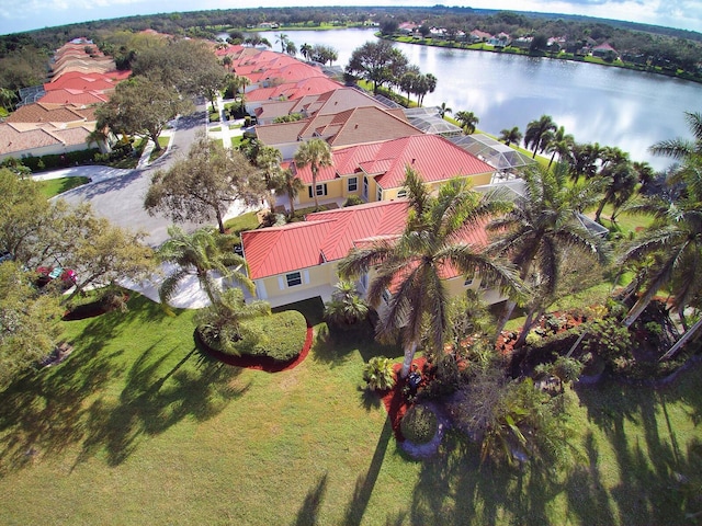 bird's eye view with a water view and a residential view