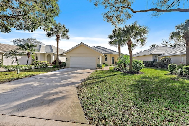 ranch-style house with a garage and a front lawn