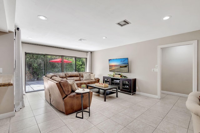 living room with light tile patterned flooring