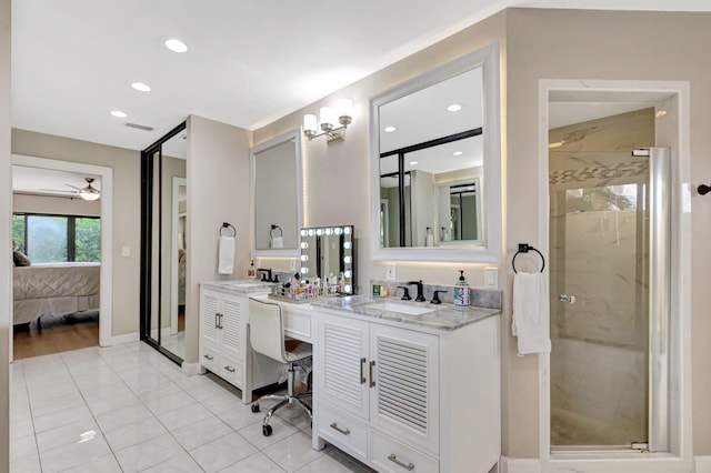 bathroom with vanity, tile patterned flooring, a shower with shower door, and ceiling fan