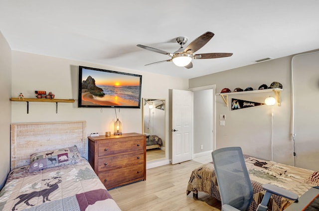 bedroom featuring ceiling fan and light wood-type flooring