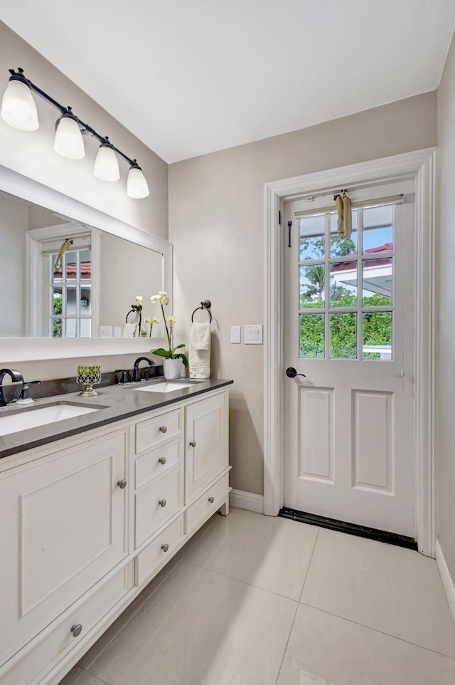 bathroom featuring vanity and tile patterned flooring