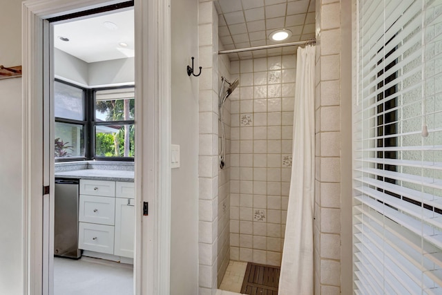 bathroom featuring walk in shower