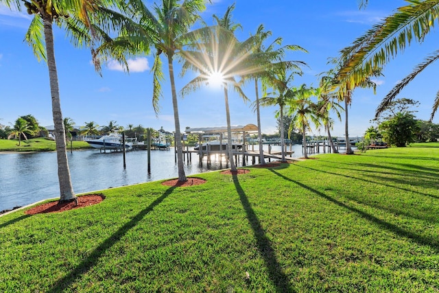 2666 SE Erickson Dr, Port Saint Lucie, FL 34984 - view of dock with a water view and a yard