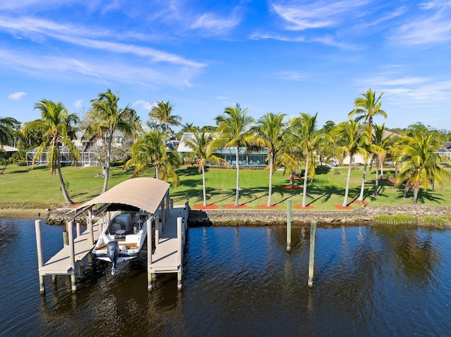 2666 SE Erickson Dr, Port Saint Lucie, FL 34984 - view of dock featuring a water view and a lawn