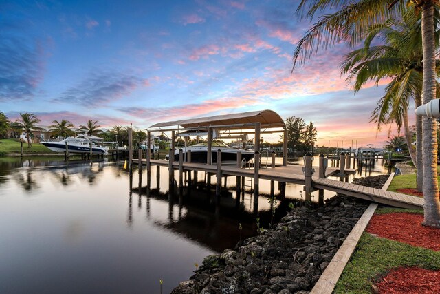 2666 SE Erickson Dr, Port Saint Lucie, FL 34984 - view of dock featuring a water view