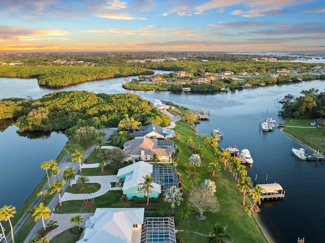 2666 SE Erickson Dr, Port Saint Lucie, FL 34984 - aerial view at dusk with a water view