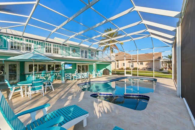 2666 SE Erickson Dr, Port Saint Lucie, FL 34984 - view of pool with a patio area and glass enclosure