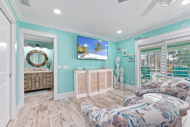 2666 SE Erickson Dr, Port Saint Lucie, FL 34984 - bedroom featuring ensuite bath, light hardwood / wood-style flooring, and ornamental molding