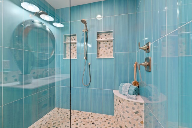 2666 SE Erickson Dr, Port Saint Lucie, FL 34984 - bathroom featuring a tile shower