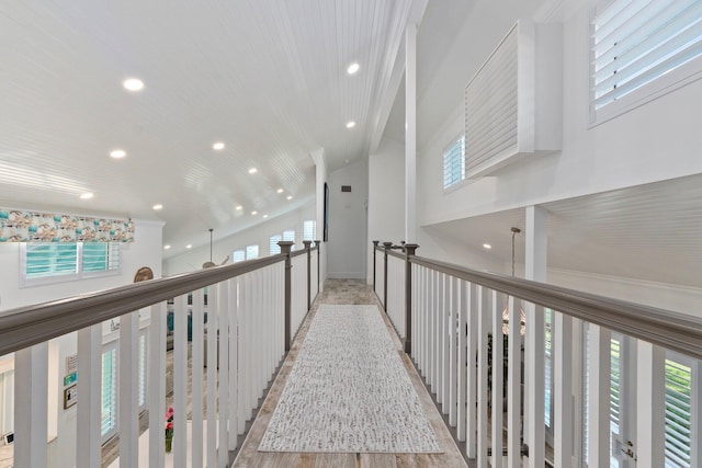2666 SE Erickson Dr, Port Saint Lucie, FL 34984 - hallway with a wealth of natural light