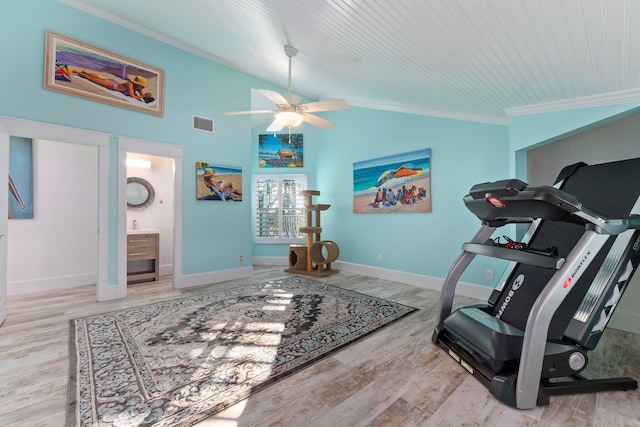 2666 SE Erickson Dr, Port Saint Lucie, FL 34984 - workout room featuring crown molding, vaulted ceiling, ceiling fan, and light hardwood / wood-style floors