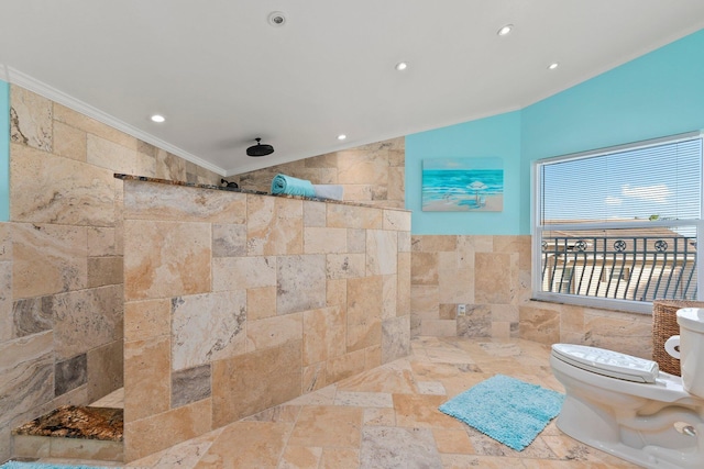 2666 SE Erickson Dr, Port Saint Lucie, FL 34984 - bathroom featuring tile walls, ornamental molding, vaulted ceiling, toilet, and walk in shower