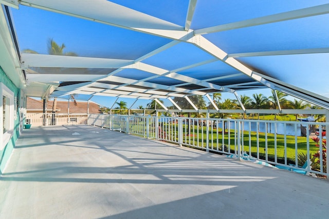 2666 SE Erickson Dr, Port Saint Lucie, FL 34984 - view of patio / terrace featuring a water view and a lanai