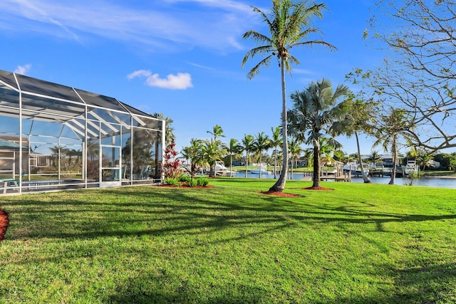 2666 SE Erickson Dr, Port Saint Lucie, FL 34984 - view of yard featuring a water view and a lanai