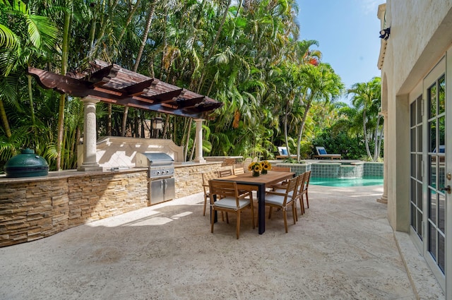 view of patio with area for grilling, a grill, a pergola, and a pool with hot tub